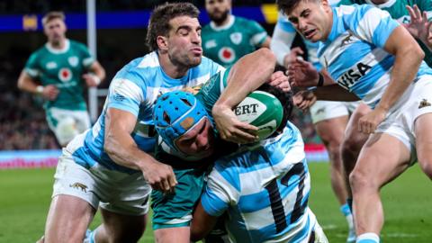 Tadhg Beirne is tackled 