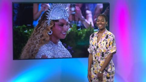 Shanequa in the studio with Beyonce in the screen