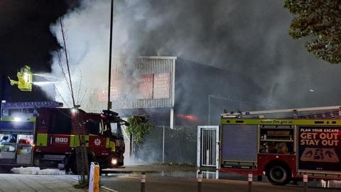 Smoke billowing from a building