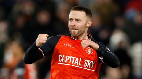 Jordan Clark celebrates scoring for Luton against Wycombe