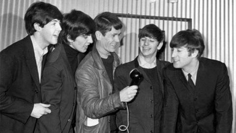 Dibbs Mather with the members of The Beatles.