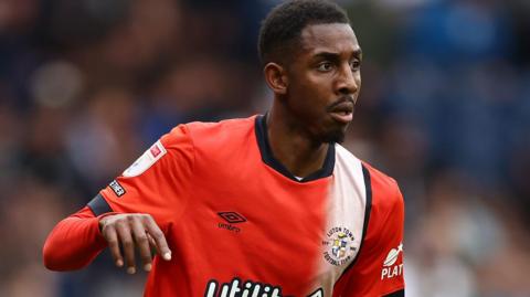 Isaiah Jones playing for Luton
