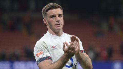 George Ford clapping spectators at the end of the Wales v England game on 15 March