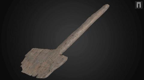 A wooden spade from the Bronze Ages found in Poole Harbour on an  archaeological dig.