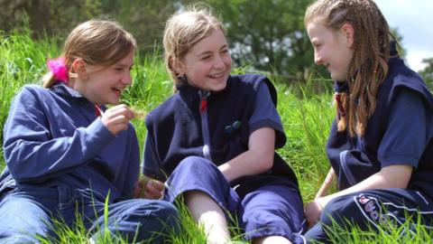 Girl guides in uniform