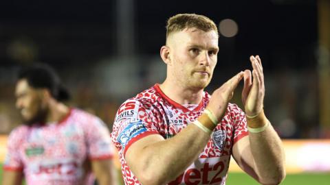 Jack Hughes applauds whilst in action for Leigh Leopards