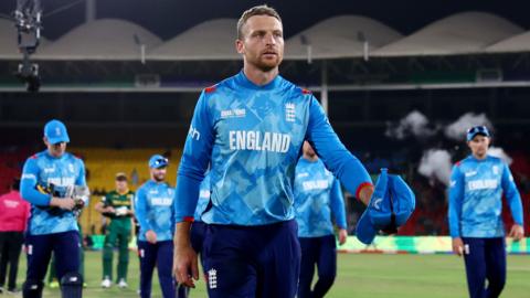 England captain Jos Buttler walks off after their defeat by South Africa in the Champions Trophy