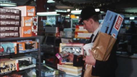 A man shopping for toys.