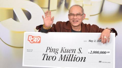 Ping Kuen with his cheque