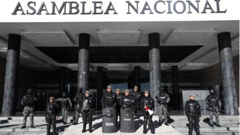 Police and armed forces guard outside the National Assembly in Quito, Ecuador, 17 May 2023.