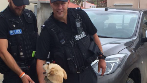 Buddy with PC Harvey, left, and PC French