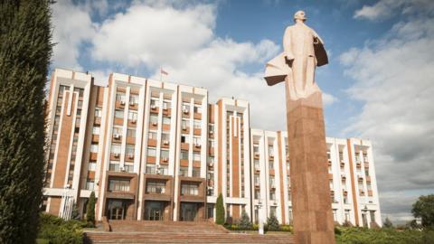The statue of Vladimir Lenin in front of the parliament building in Tiraspol, capital of the unrecognized Pridnestrovian Moldavian Republic, or Transnistria