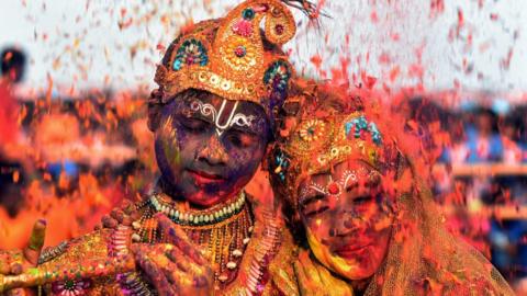 Students at the Holi festival.