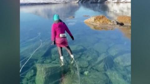 Skating on an "ice window" in Alaska