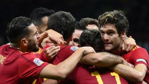 Spain celebrate Ferran Torres goal