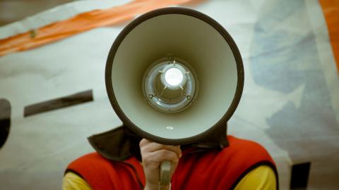 Person with megaphone