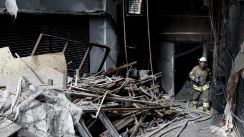 Firefighter at the scene of a fire at a nightclub in the basement of a 16-story building in Besiktas district of Istanbul, Turkey on April 02, 2024