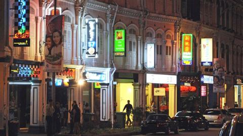 This photo taken on August 27, 2008 shows rows of pubs and bars along a street in Tanjong Pagar in Singapore.