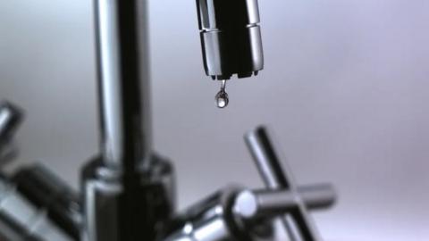 Water dripping from a tap