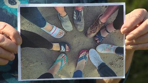 Feet on a beach