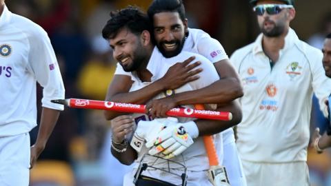 India celebrate beating Australia at the Gabba