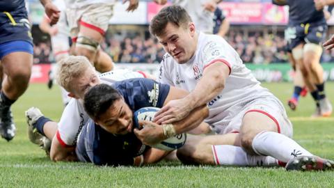 Ulster's Jacob Stockdale fails to prevent Clermont's George Moala scoring a try in the 2019-20 pool game in France