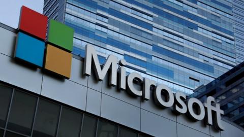 The Microsoft sign is shown on top of the Microsoft Theatre in Los Angeles, California