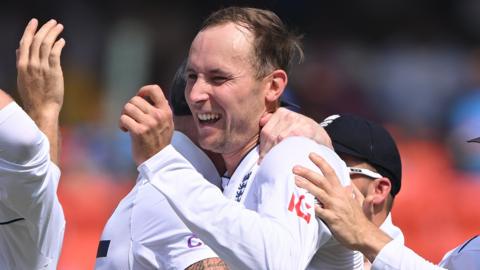 Tom Hartley celebrates a wicket