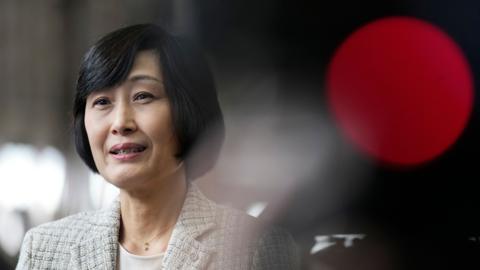The newly-appointed Japan Airlines Co. President Mitsuko Tottori speaks to reporters after the company entrance ceremony at a Haneda airport maintenance hangar in Tokyo, Japan, 01 April 2024.