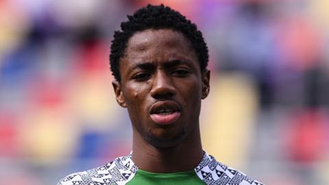 Football player Benjamin Fredrick of Nigeria sings the National Anthem during FIFA U-20 World Cup Argentina 2023 Quarter Finals match between Korea Republic and Nigeria