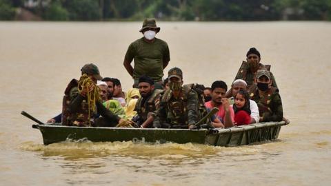 Rescue workers in Assam