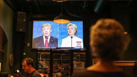 A viewer watching the final presidential debate in a bar in North Carolina