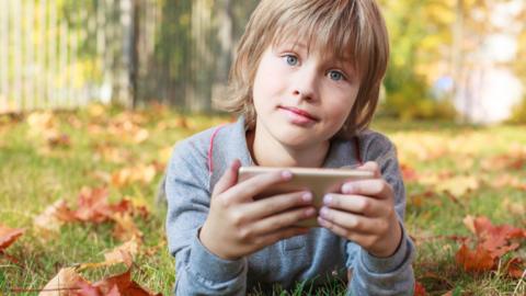 Child using smartphone