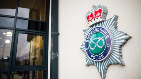 Staffordshire Police crest outside of its headquarters.