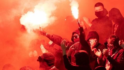 Motherwell fans let off flares