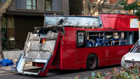 The remains of a bus used as a prop on a film set on Spa Road, in Bermondsey, south London, during filming about the 7/7 London bombings.