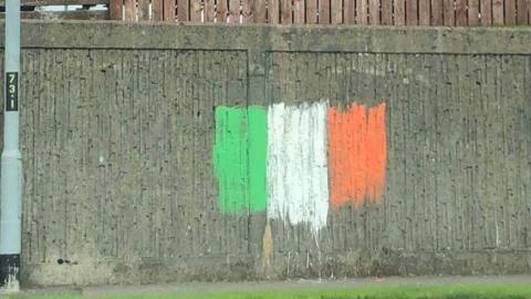 Irish tricolour graffiti painted on wall in Limavady.