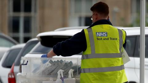 An NHS test and trace worker