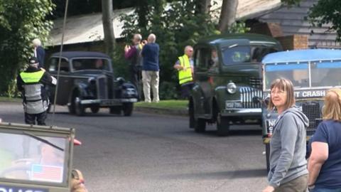 Vehicles re-enacting a historic military convoy