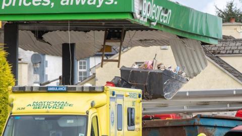 An ambulance at the scene of the service station explosion in Creeslough