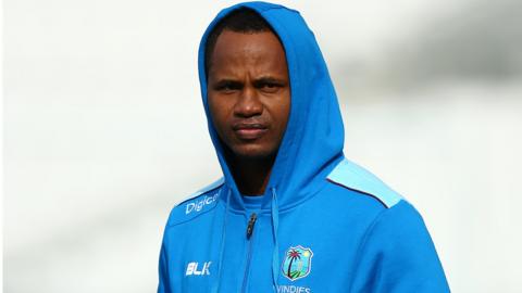 Marlon Samuels wearing a West Indies tracksuit during training