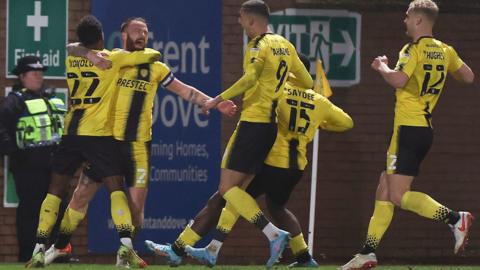 Burton celebrate one of John Brayford's two goals against Bolton