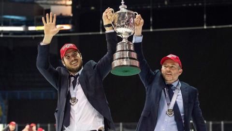 Cardiff Devils Head Coach Brodie Dupont with Assistant Coach Neil Francis with the 2022 Elite League Play-off Trophy