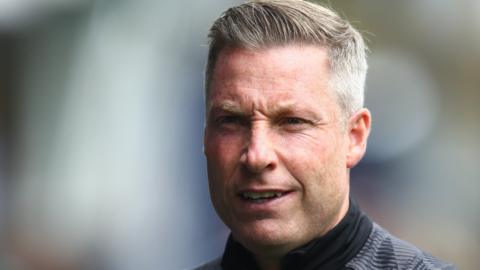 Neil Harris was previously manager of Millwall, Cardiff and Gillingham