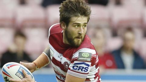 Joe Shorrocks plays the ball for Wigan