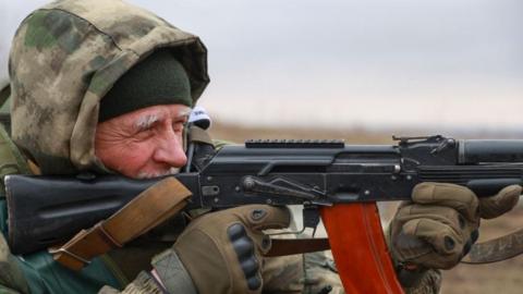 Russian serviceman aims his weapon during an exercise aimed at coordinating troops of the military contract unit 'Bars-13', at a military shooting range near Donetsk city, Donetsk region, eastern Ukraine, 05 February 2024