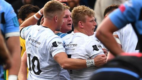 Sam Parry celebrates his try for Ospreys