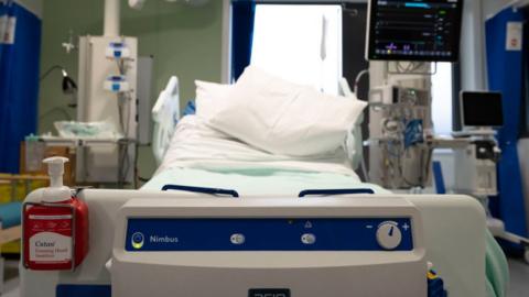 Empty intensive care bed