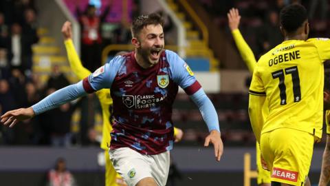 Burnley's Halil Dervisoglu of Burnley celebrates scoring to make it 3-2