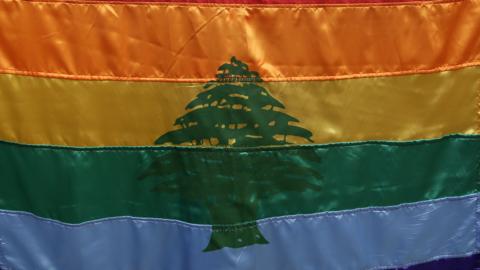 Gay pride flag with a cedar of Lebanon used by activists at a rally in Beirut on 30 April 2013